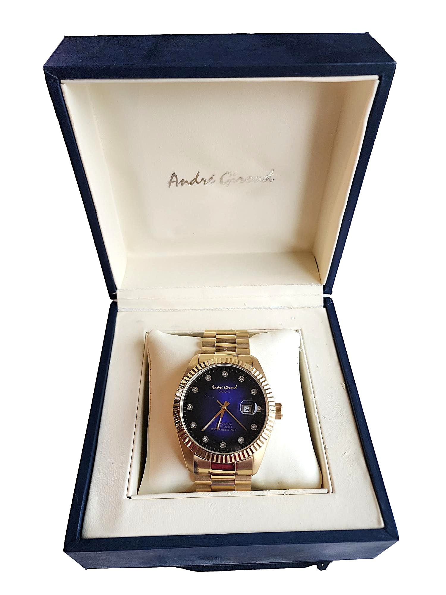 Vintage Andre' Giroud Men's Wristwatch - Automatic Movement - Limited Edition: This is a fabulous watch. The Watch face is Blue. The hour markers are diamonds. The case and band is gold plated. Water resistant 10ATM / 330 Ft. Stainless Steel. Being vintage, although this watch i