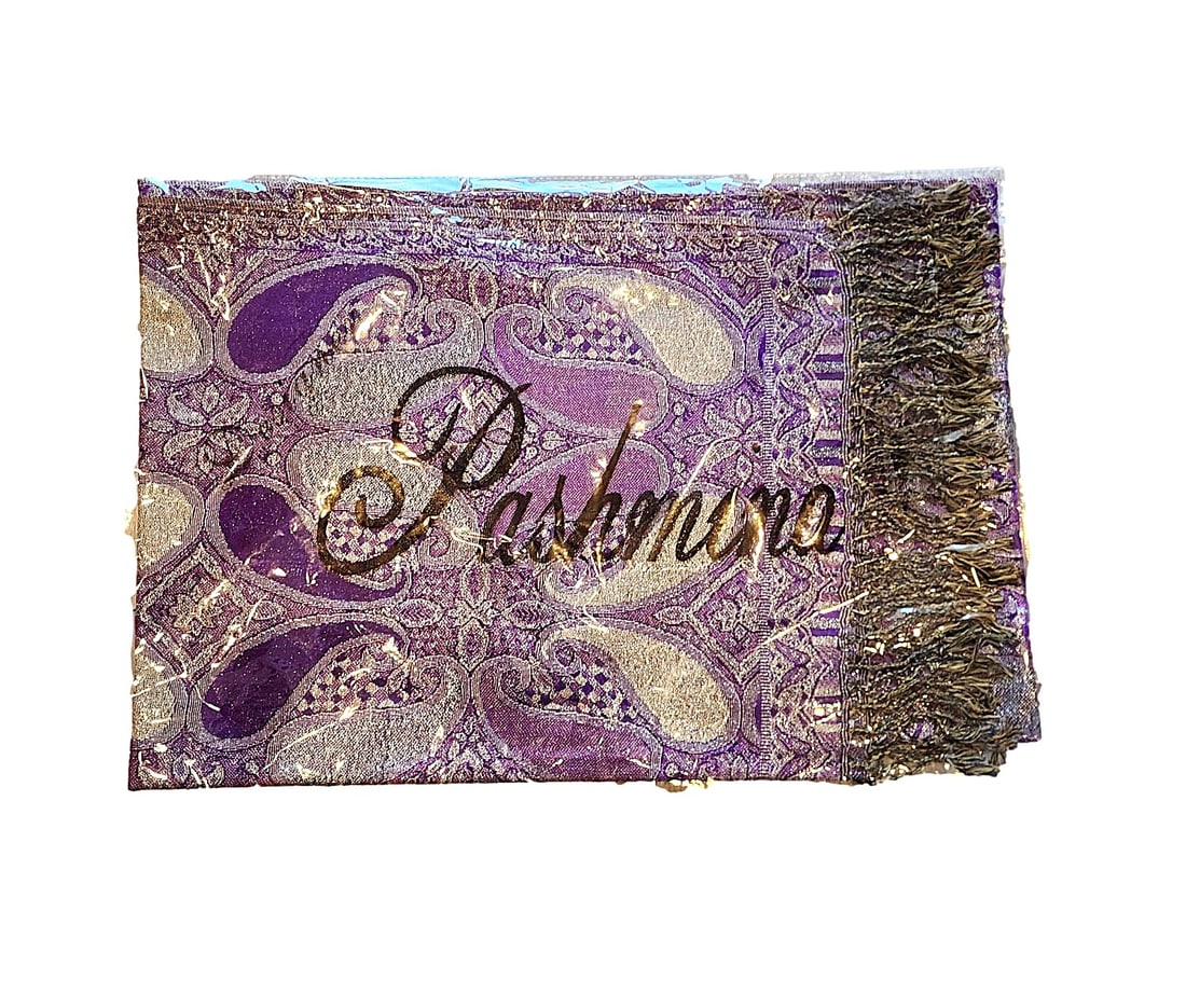 Purple and Silver - Violet Pashmina Scarf - New in Packaging: This scarf is very much like the Navy blue scarf in that the colors were hard to capture. The paisley patterned colors are Purple and Silver. 45% Silk and 55% Pashmina. It features silver metallic thr