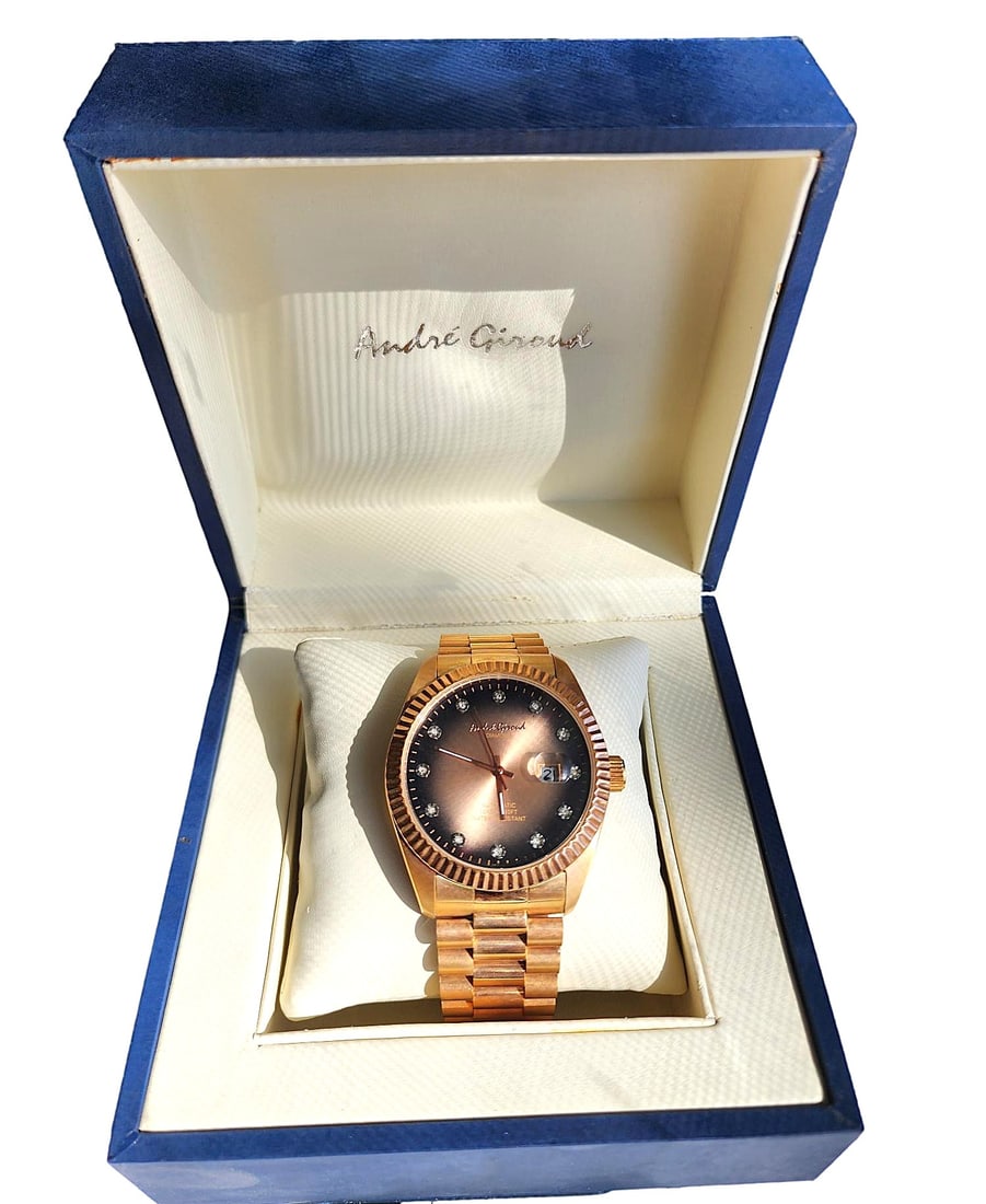 Vintage Jacot Men's Wristwatch Rose Gold Plated - New in Box - Limited Edition: This Limited Edition Andre' Giroud Watch is very attractive with it's Rose Gold Plated Stainless Steel case and band. The watch face is a Smokey amber color. Diamonds are set for the numbers on the fa