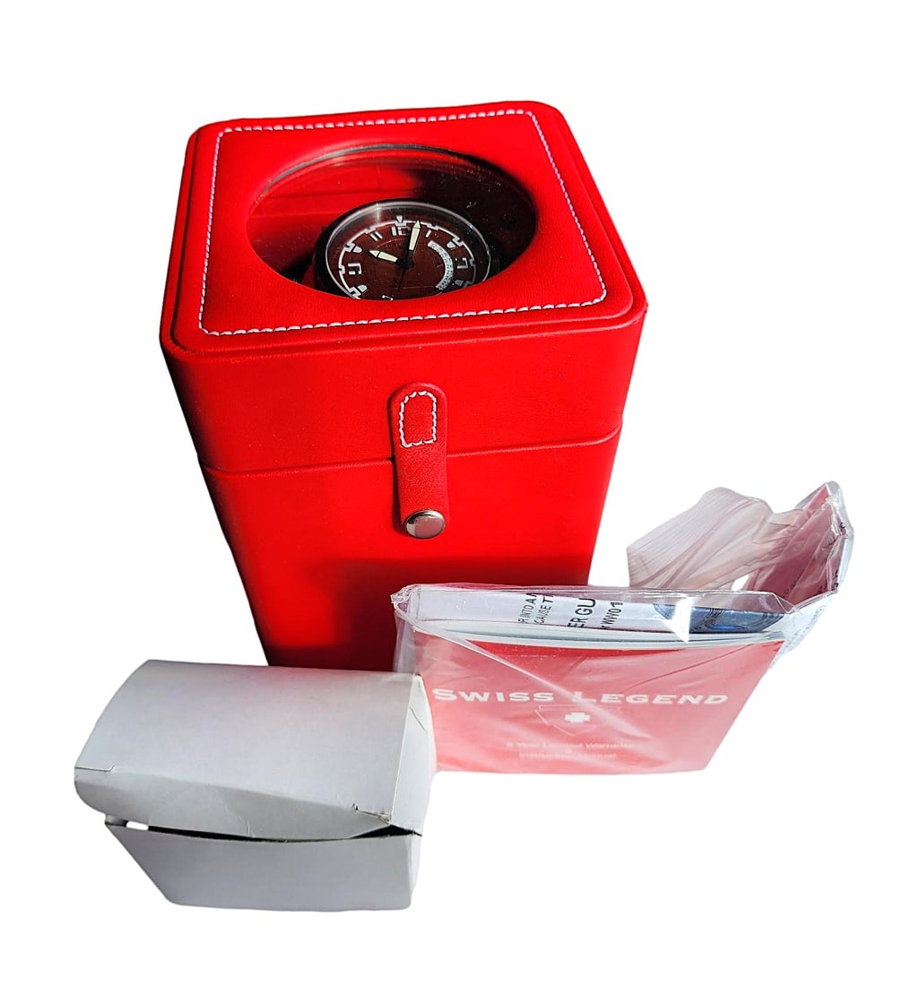 Vintage - New Swiss Legend Men's Wristwatch - Automatic Movement: This watch comes with original packaging and all parts are present. The watch features a red face with black stainless steel case and band. Band features a snap locking closure. 316L Stainless Steel.