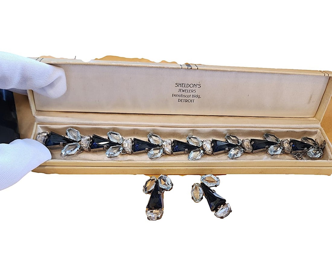 1942 Costume Bracelet Designed by Sheldon's Jewelers of Detroit: This is an estate piece. Given to my mom by a close friend she worked with. This is a bracelet and earring set, designed and made by Sheldon Jewelers of Detroit in 1942. It comes with the original bra