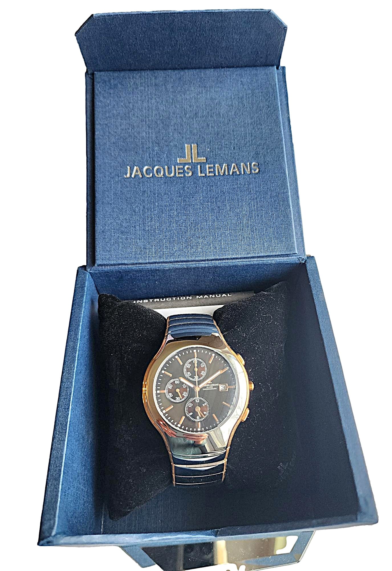 Vintage but New Men's Wristwatch by Jacques Lemans - Chronograph: Another exquisite dress watch. Absolutely beautiful. All Stainless Steel, 10 Atm Water Resistant. Chronograph Alarm. #1-1307 Screw case back. Original box and booklet included. Due to the age of this
