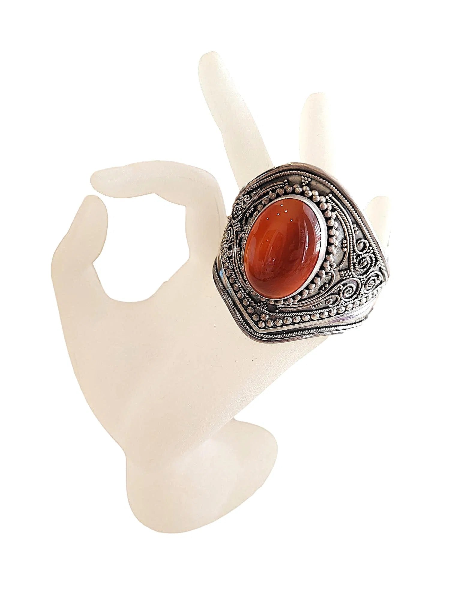New Large Sterling Silver Cuff Bracelet with Red Carnelian Oval Stone.: Large Sterling Silver Cuff bracelet featuring an oval red Carnelian center stone. Elaborate Metal work, Stamped 925. This bracelet flexes to adjust fit. New