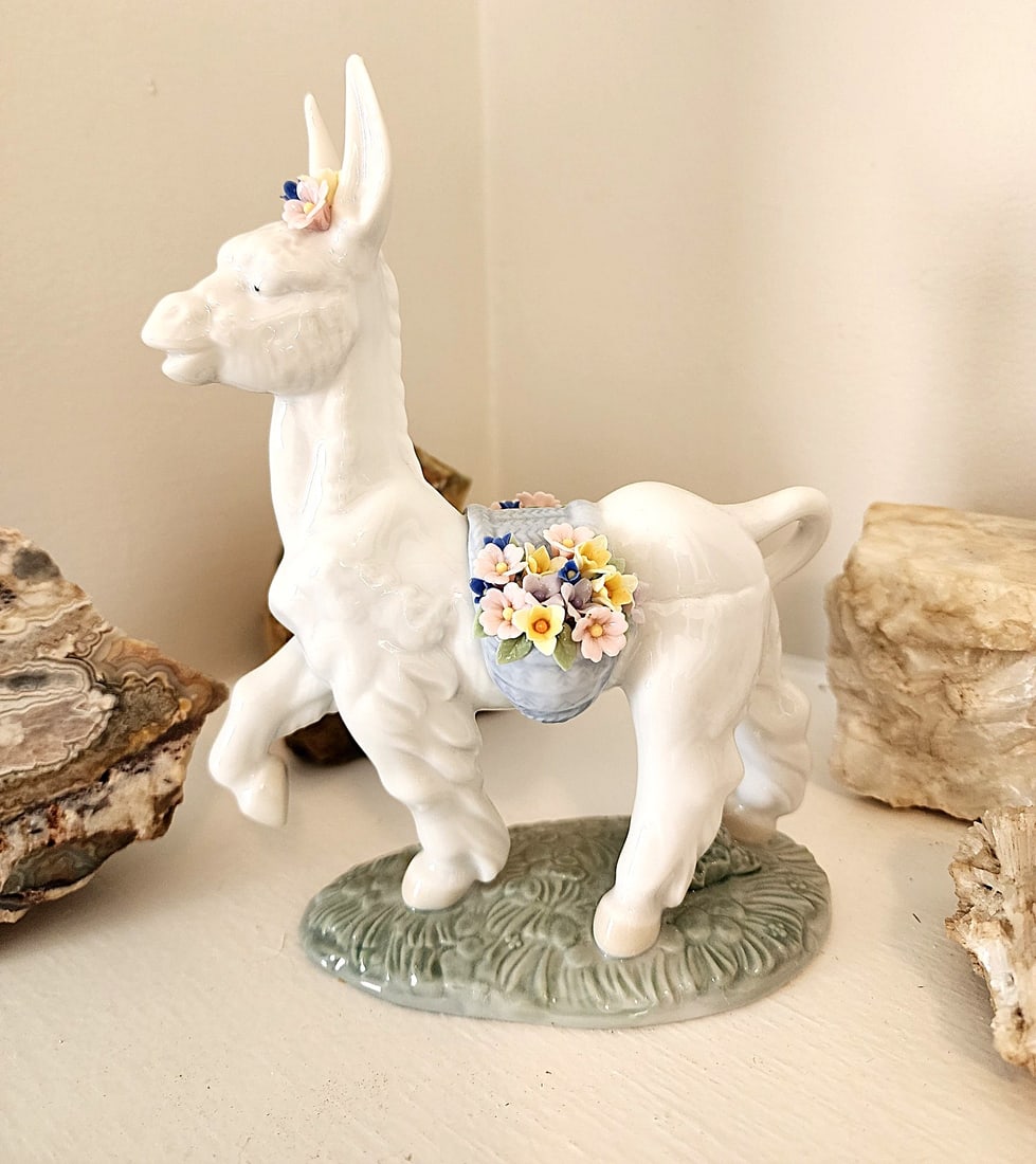 Retired Lladro - " Parading Donkey" by Juan Huerta.: From a Private Collection. The Lladro Donkey Figurine #6573, officially titled "Parading Donkey" (sometimes called Burrito Paseo), is a retired porcelain sculpture designed by sculptor Juan Huerta. I