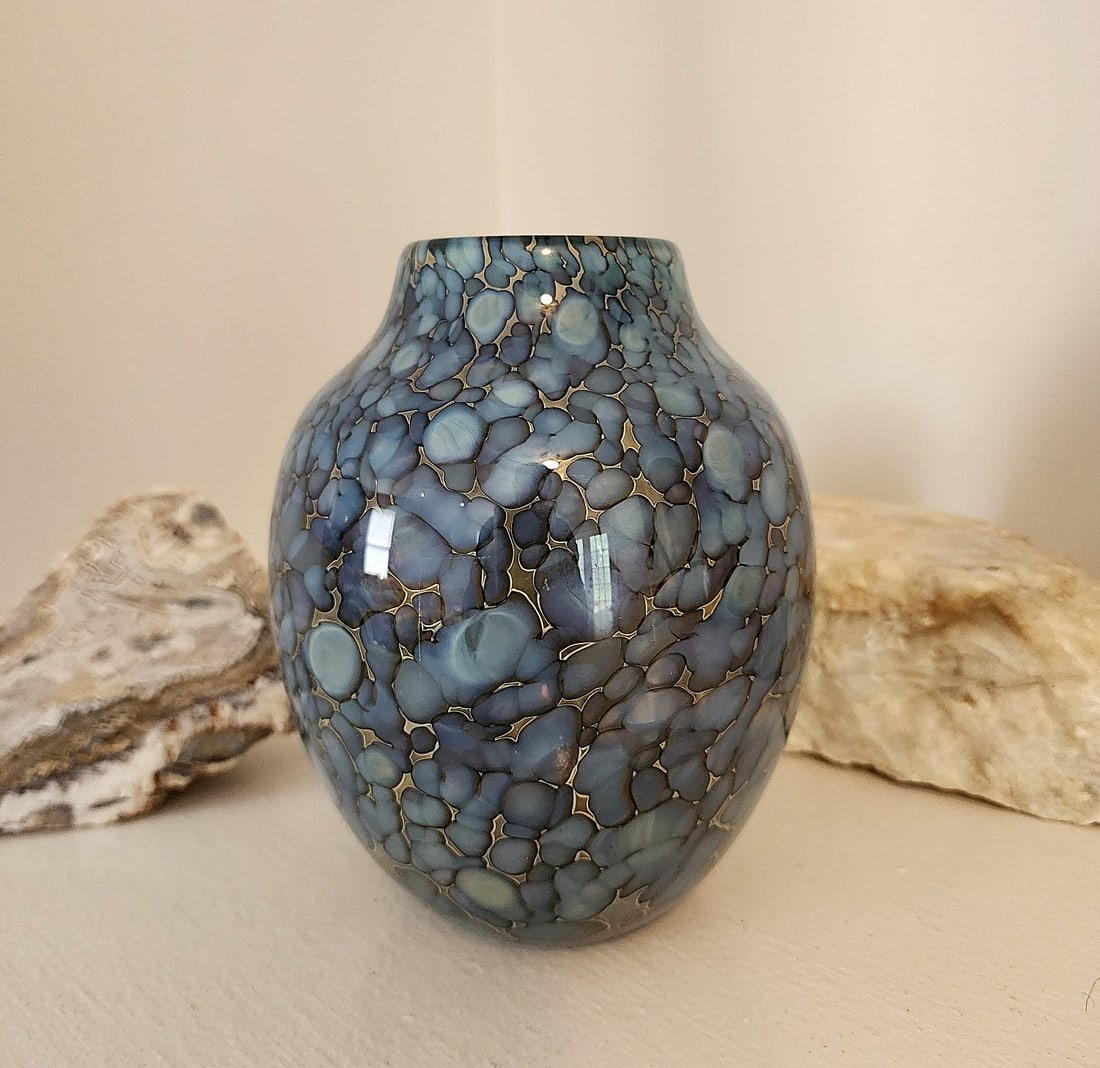 Art Glass Vase by Alan Goldfarb - P83. 'Snakeskin' mottled.: Artist Inscribed "Goldfarb p '83" on the bottom. Glasswork piece described as 'Snakeskin". .Design: Features a coiled layer of glass with a "snakeskin" motif, sandwiched between layers of clear