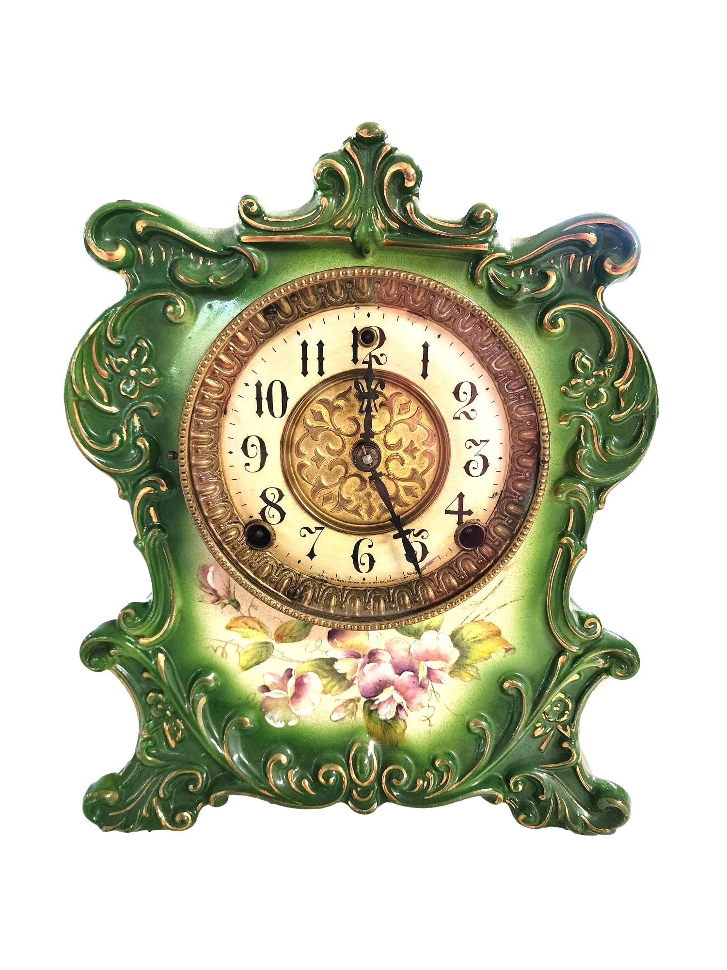 Ansonia Mantle Clock - New York - Green and Gilt.: Late 19th century. Porcelain. Floral Design with a vibrant green finish and floral design. This is one of my antique clocks. I bought it because it made a pretty display. I am missing the pendulum and
