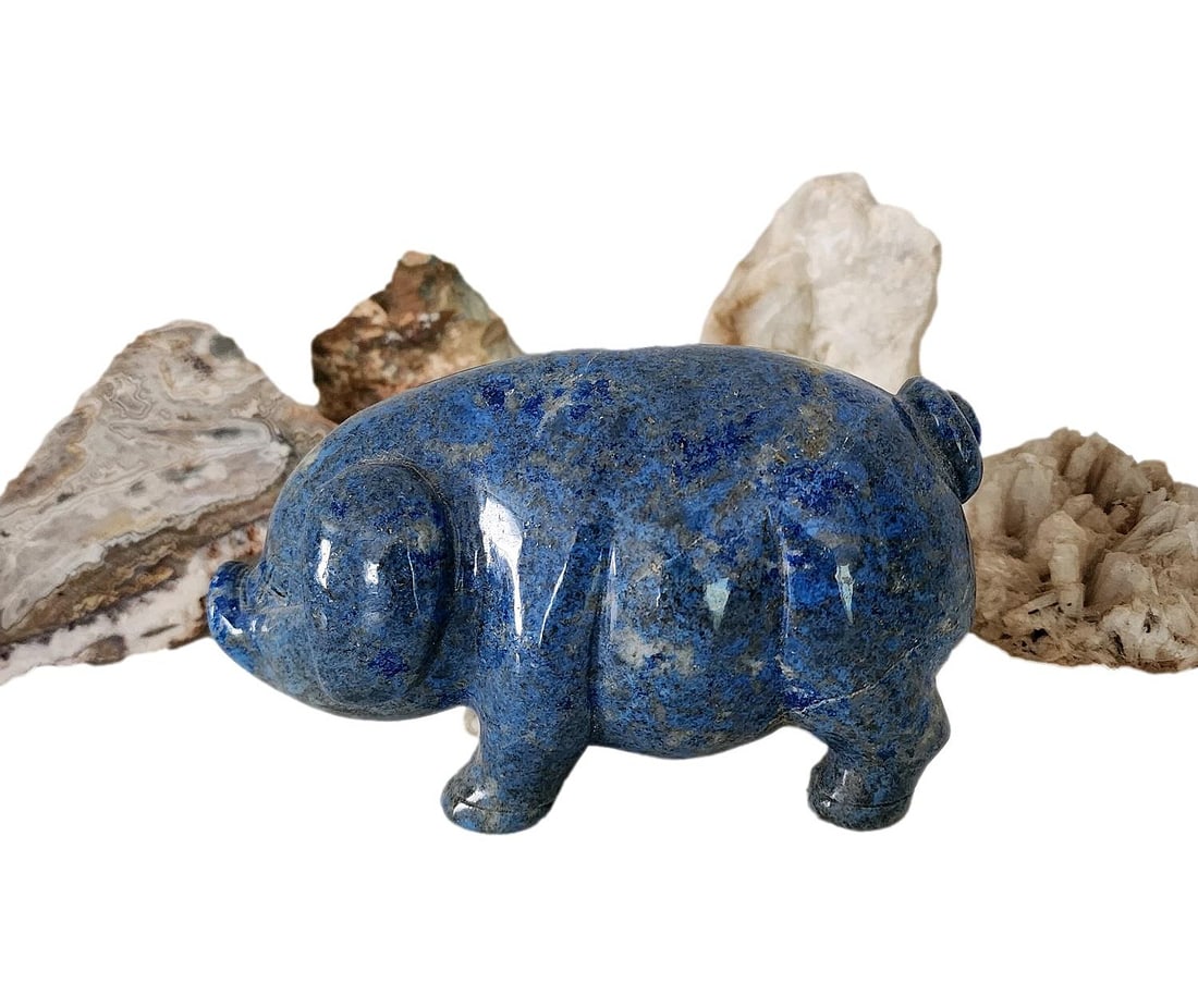 Lapis Lazuli Hand-carved Pig Figurine/Paperweight - 1489 grams: I collect rock and stone figures when I come across interesting pieces. I bought a group of Lapis Lazuli figures from student works. This pig is nicely carved, and the stone is nicely colored. It weig