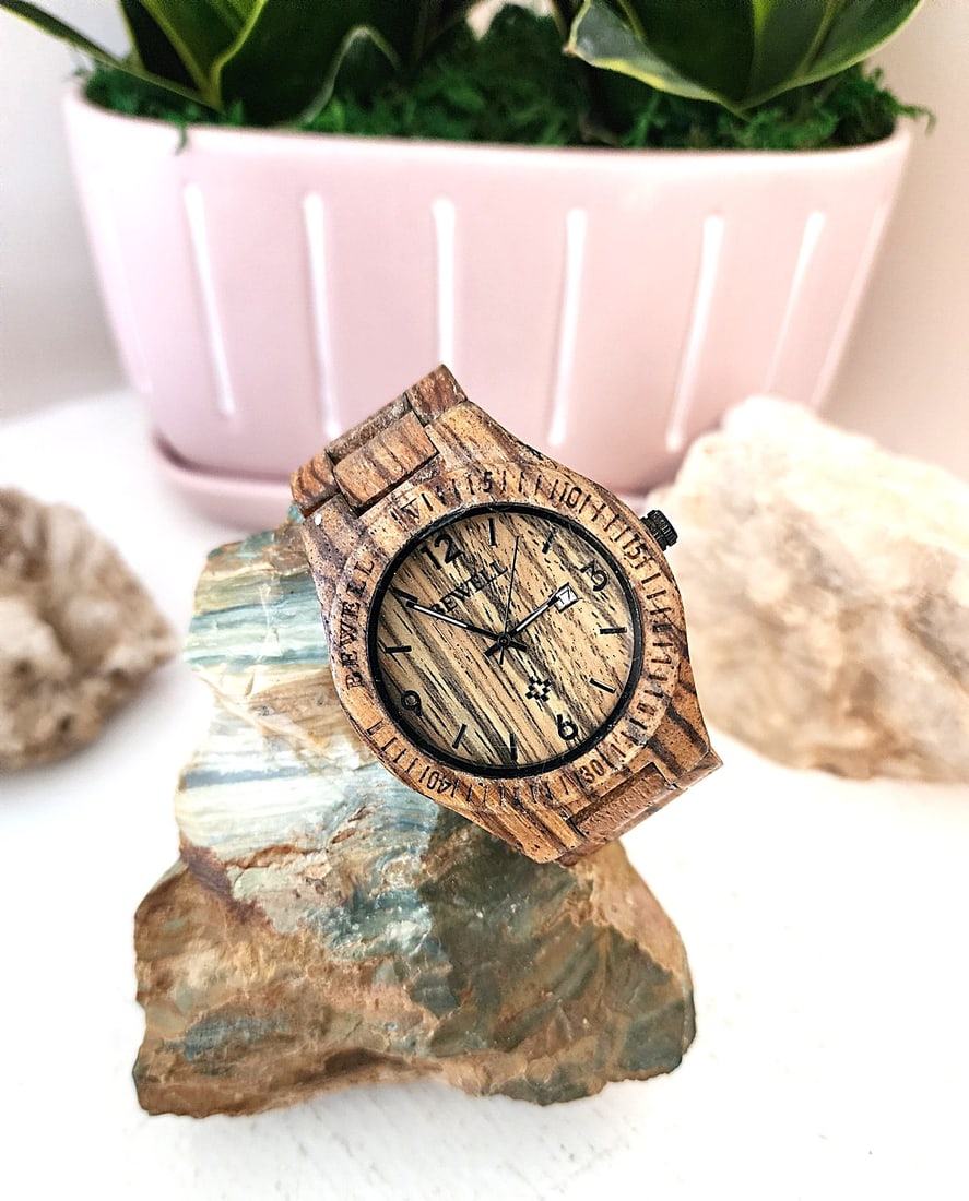 Vintage Wooden Men's Watch by Bewell - In Running Condition - Quartz: This watch is very nice. It is wooden casing and strap. Light weight. The back has a screw back. Folding Latch Closure. New Battery and Running. Bewell offers a popular line of handcrafted, eco-friend