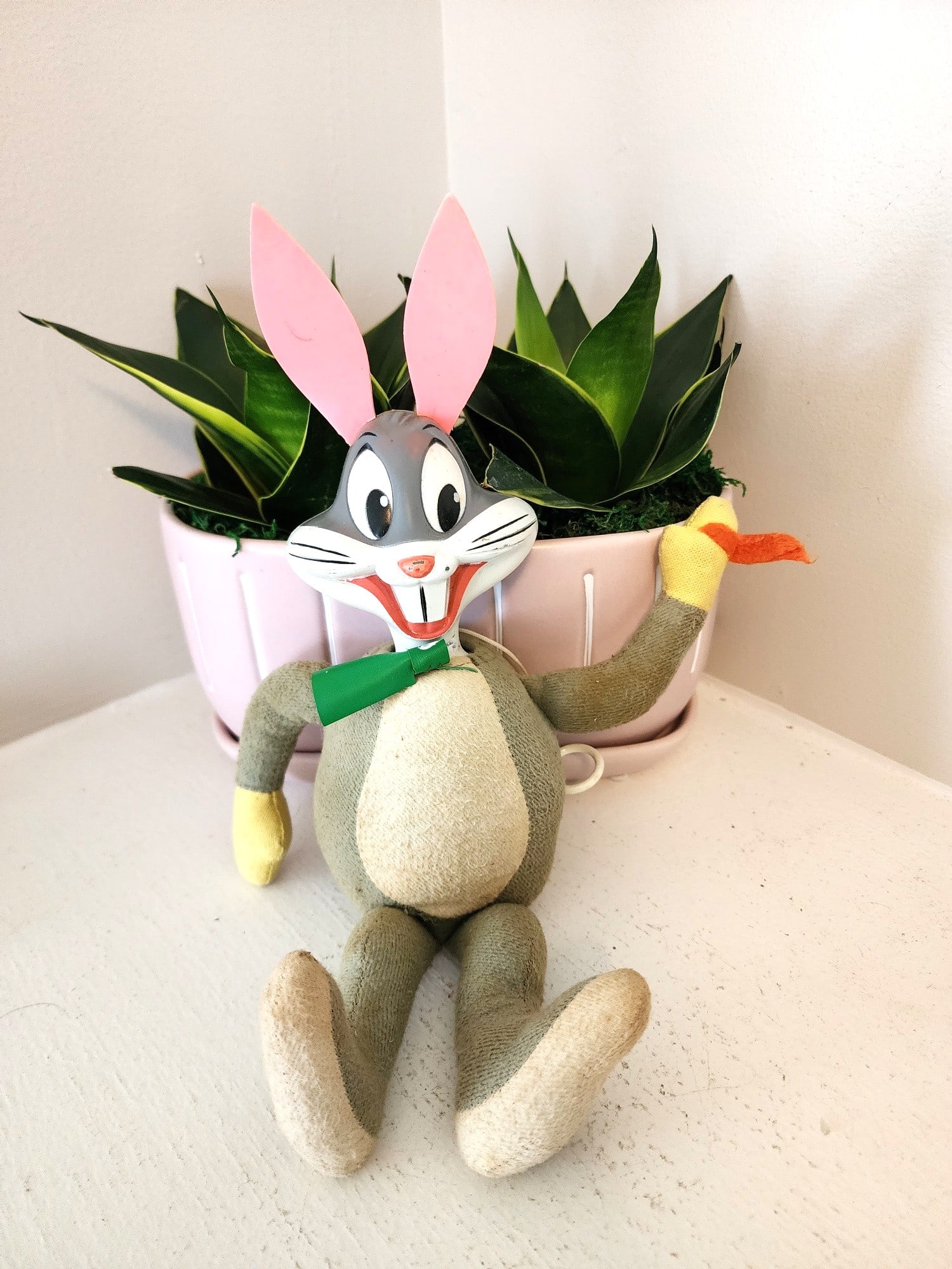 Vintage Mattel Looney Tunes Talking Bugs Bunny Doll - Working. c, 1971: This is a find. It has been previously loved by someone, but, overall not in too bad of condition. It features a plastic head and ears. 12 inches tall. In one hand he has a felt carrot. The green tie 