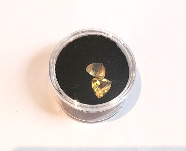 2 Trillion Cut Topaz Gemstones - 1ct each: Nicely colored and nice cut genuine Topaz gemstones. Matching Pair! Yellow with hints of orange.