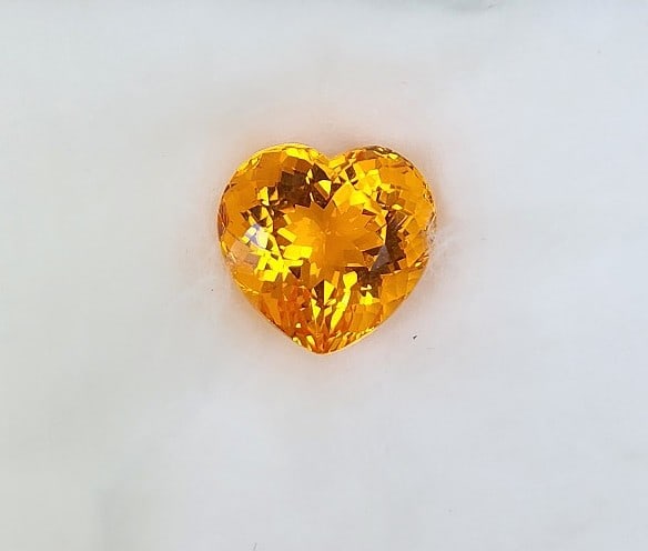 23.20 ct. Stunning Top Heart Shaped Orange Citrine Gemstone.: The cut on this stone is very nice with lots of angles to bring out the best of this stone. Lots of flash and sparkle.