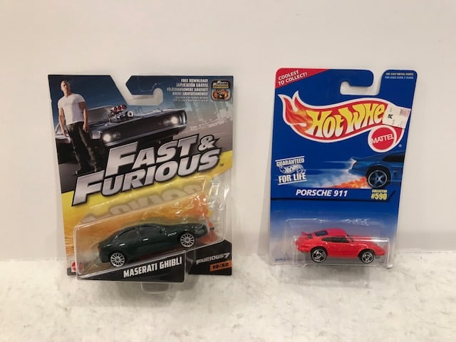 (2) Die Cast Hot Wheels Fast and Furious: (2) Die Cast Hot Wheels Fast and Furious. Size: 6"w x 5"d x3"h