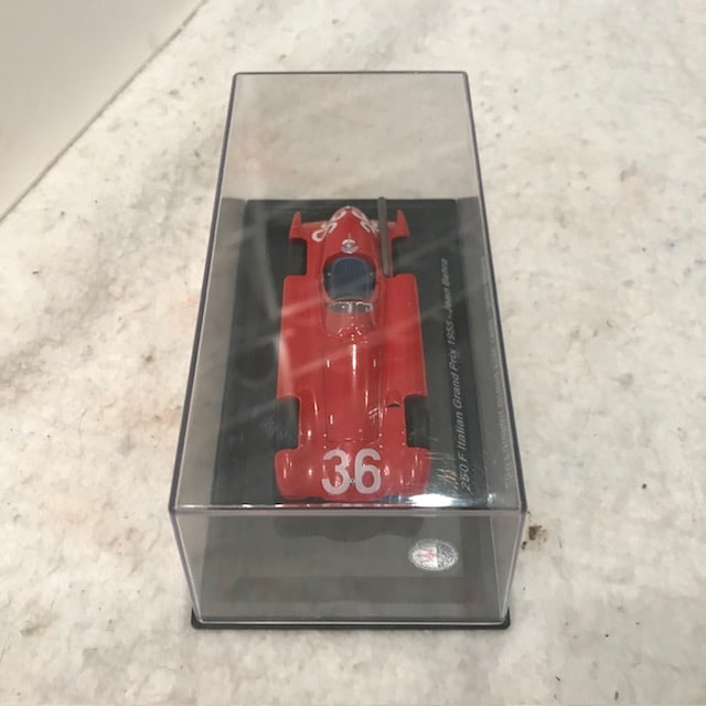 Die Cast Maserati 250F Italian Grand Prix Jean Behrra Red in Case: Die Cast Maserati 250F Italian Grand Prix Jean Behrra Red in Case. Size: 5"w x 2"d x3"h