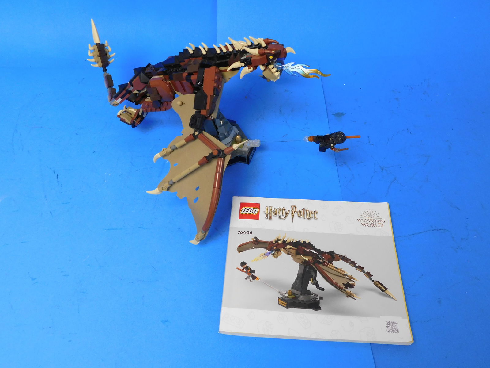 Lego Harry Potter 76406 Hungarian Horntail dragon. Loose built up with instruction book: This lot contains 76406 Hungarian Horntail Dragon set that is built up. Has the instruction book.
