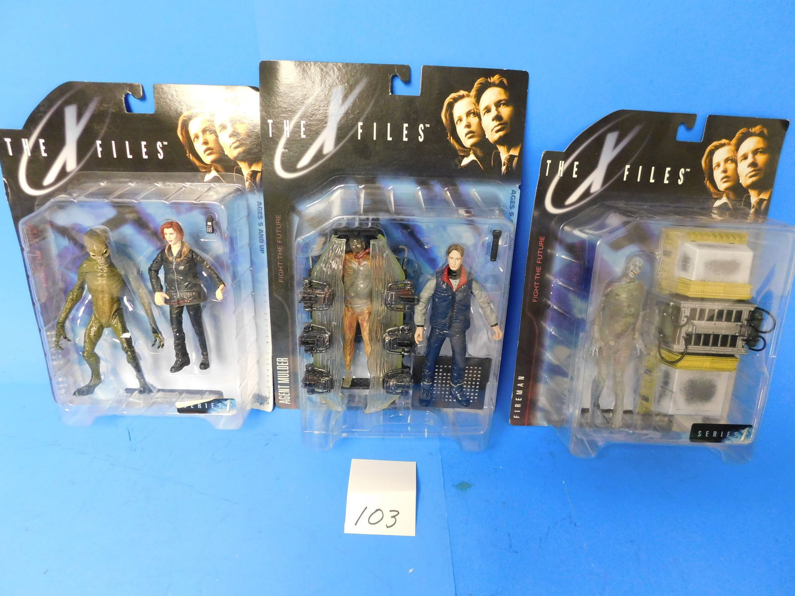 X-Files Action Figures on cards. Scully Mulder Fireman (1 of 4)