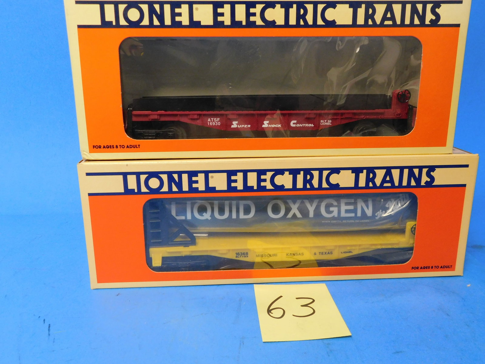 Lionel santa Fe Wheel Car and KATY liquified Oxygen Car 6-16930 and 6-16368: Lionel Santa Fe Wheel Car. Wheels are in Bag in box. 6-16930 and KATY Liquified Oxygen Car 6-16368 In Box