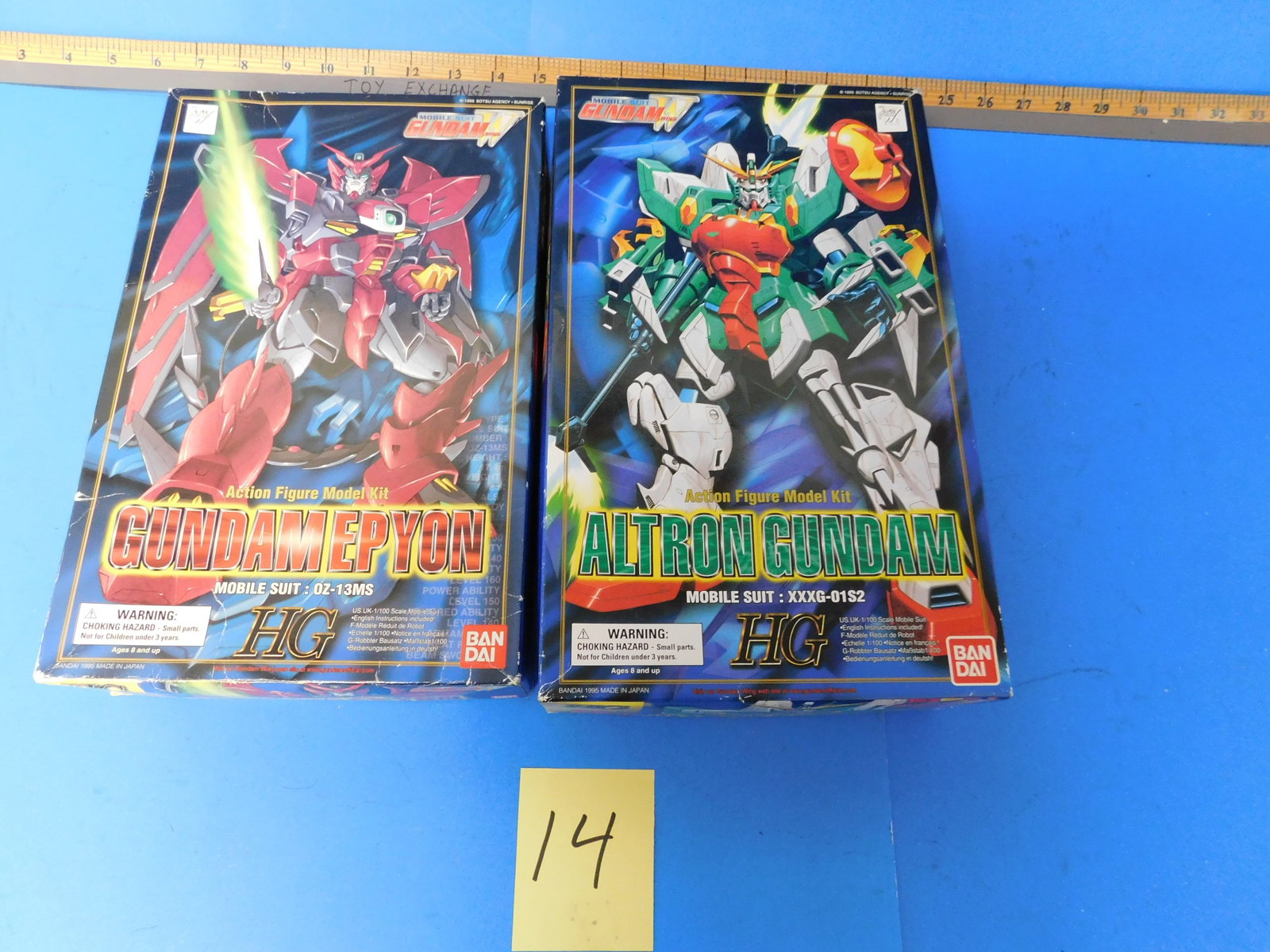 Bandai Gundam Kits Open Box: two Gundam Kits by Bandai. One is started the other looks like it is finished