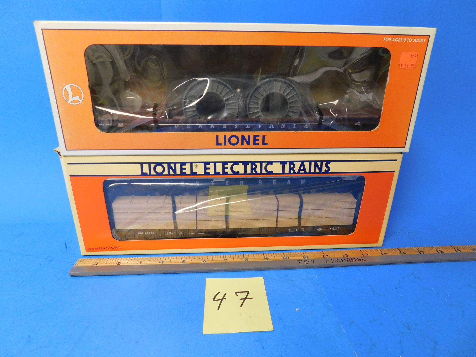 Lionel Western Pacific I Beam car. PRR Well Car. NIB, Old store stock: Lionel 6-16399 Western Pacific I-Beam Flatcar, 6-16983 PRR Well car. New in box. Old store stock