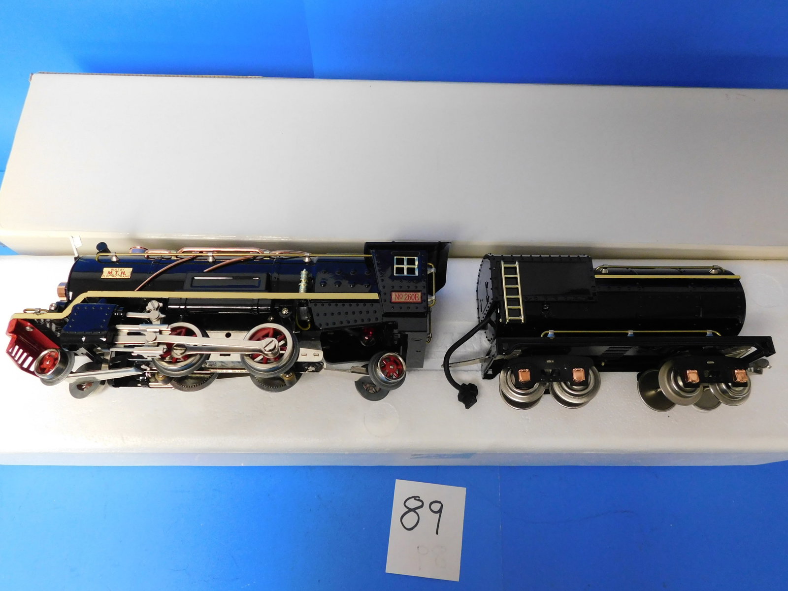MTH no 260 Black Brass with Cream Stripe Warehouse. PS1: From MTH warehouse. 260 with PS1. At time of posting the PS1 was checked out by MTH tech. From Warehouse. Color is Black with Cream Stripe. In a White box from Warehouse.