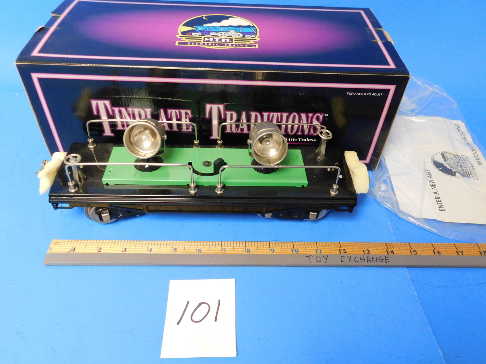 MTH tinplate #220 Searchlight car. From warehouse Standard gauge: MTH Tinplate Traditions 10-1076 #220 Searchlight car. Black with Medium Green and nickel Trim. Standard Gauge. With MTH Retail box. Box shows storage and shelf wear. From the MTH warehouse.