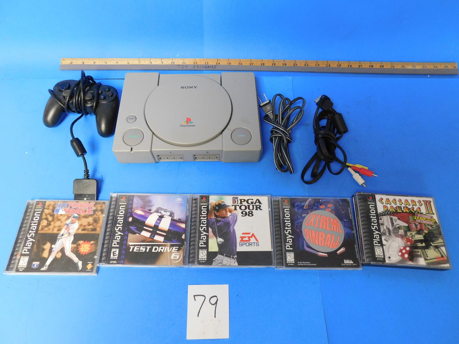 Sony Playstation Game System and games. With 1 controller loose. (1 of 5)