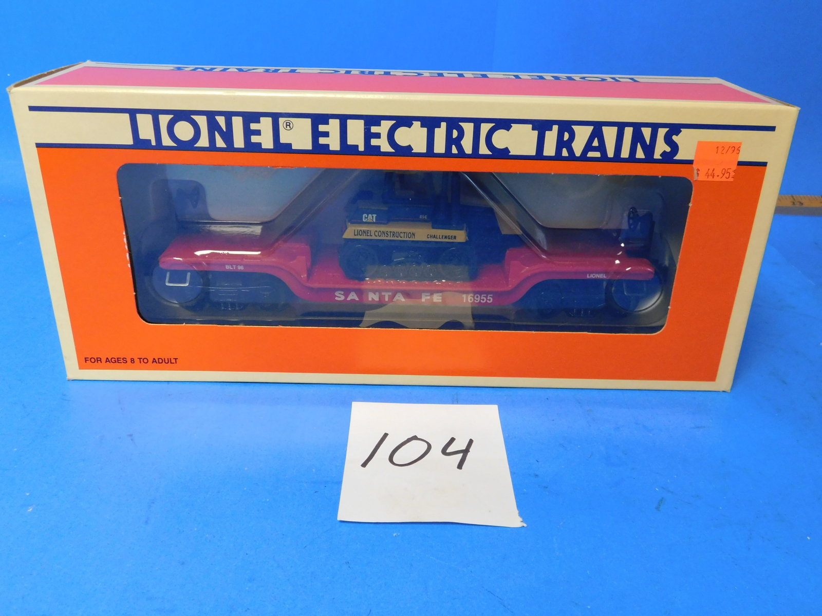 Lionel AT&SF Santa Fe Flatcar with ERTL Challenger Front Loader. 6-16955: Lionel 6-16955 Santa fe flat with ERTL farm Challenger. New in box. Old store stock