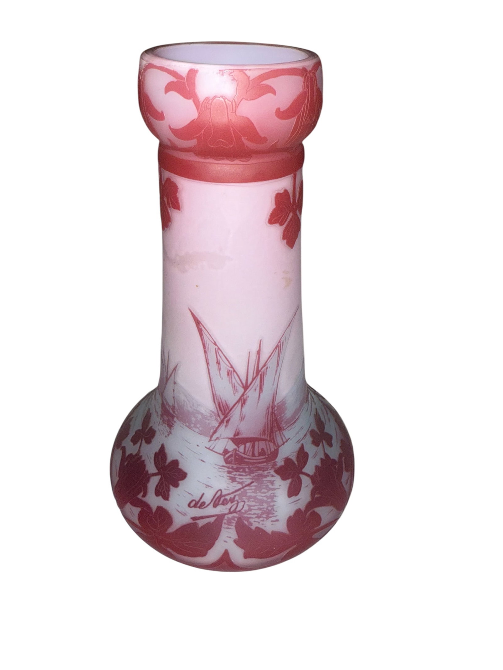 Art Nouveau DeVez Cameo Glass Vase Sailing Ships: French Cameo Glass DeVez Vase, with a depiction of a harbor scene cameo cut into the glass. Replete with sail boats, swirling leaves and a fleur de lis design arond the top of the vase. Soft red and p