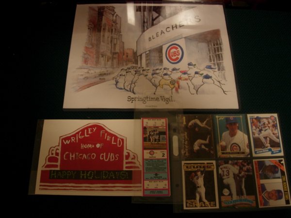 12 Chicago Cubs Collectors Items Cards+++: Chicago Cubs Collectors Lot. (12 items) Includes; 1992 Cubs Matchbox car, 1985 "Spring Vigil" cartoon print (11"x14") by Jeff MacNelly from the Chicago Tribune, (2) holiday cards from the Chicago Cubs