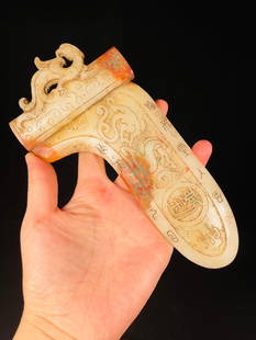 Chinese archaic jade plaque Han Dynasty: Size: Width 20.5 cm - Height 10 cm Materials: Natural jade Time Period: Han dynasty Manufactured Date: 1st-c Origin: China
