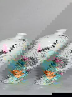 Chinese famille rose porcelain vase pair Qing dynasty Yongzheng Mark & Period: Size: Height 17.3 cm - Width 11 cm Materials: Porcelain Time Period: Qing dynasty Manufactured Date: Yongzheng Mark & Period Origin: China