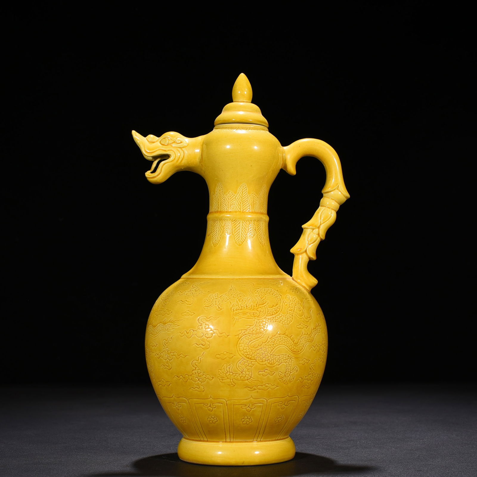 Ming Dynasty Hongzhi delicate yellow glaze engraved with dragon head holding pot: Size: Height 28 cm - Width 15 cm Materials: Porcelain Time Period: Ming dynasty Manufactured Date: Hongzhi Mark & Period Object: Chinese Antique ⛨ Purchase With Confidence ✔ Verifie