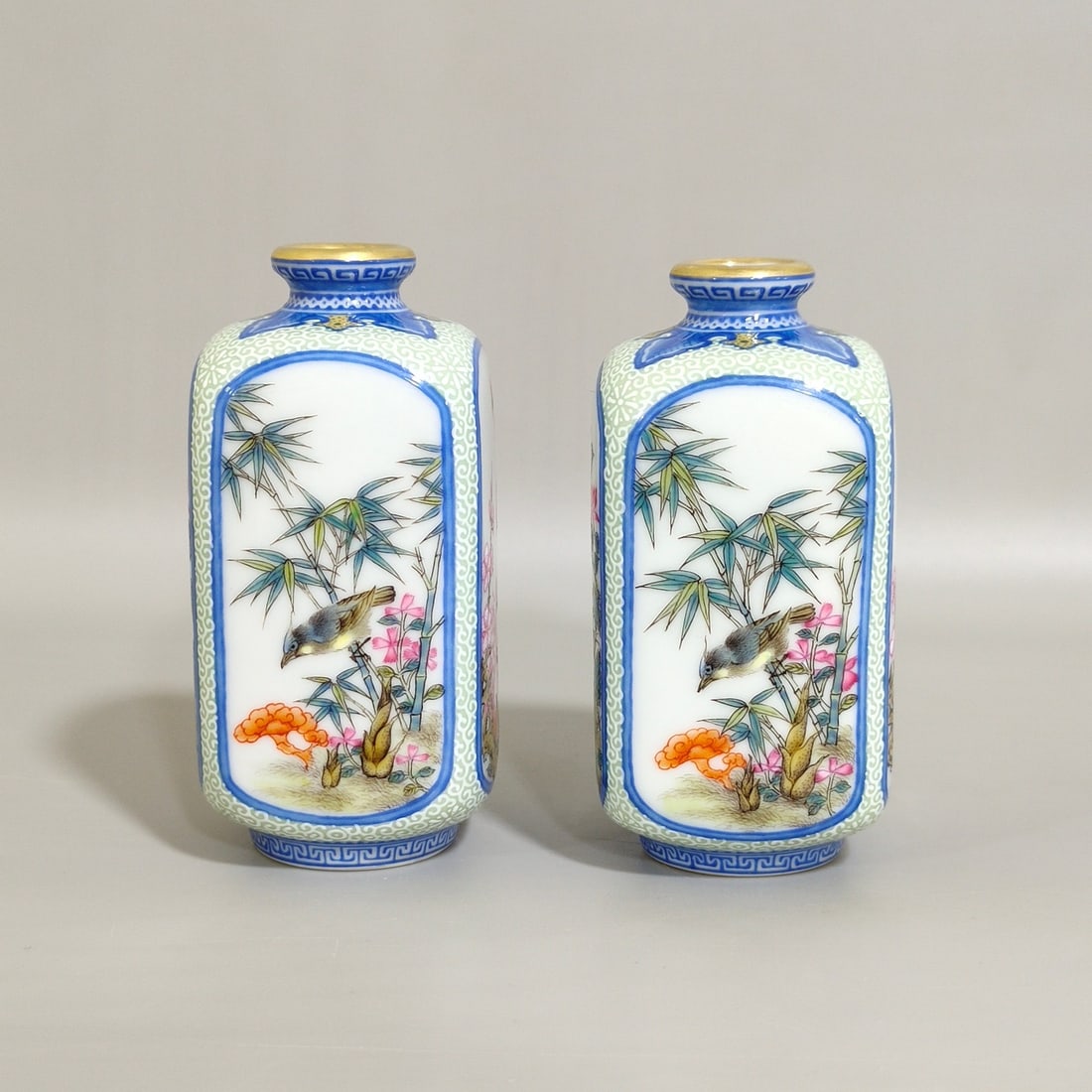 Qing Dynasty Yongzheng enamel emerald edge window four-season flower snuff bottle (1 of 9)