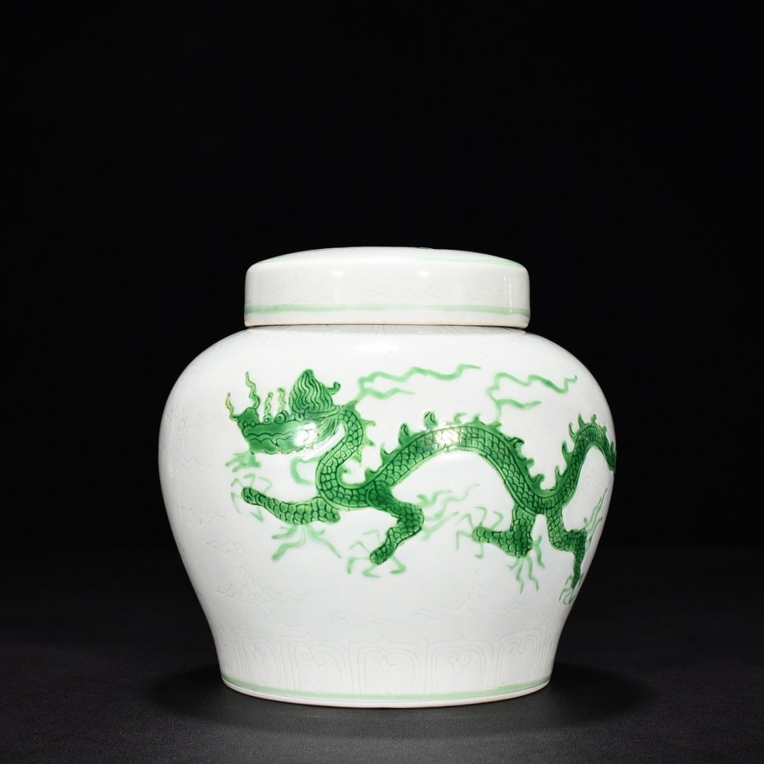 Ming Dynasty Zhengde green glaze dark engraved cloud and dragon cover jar (1 of 8)