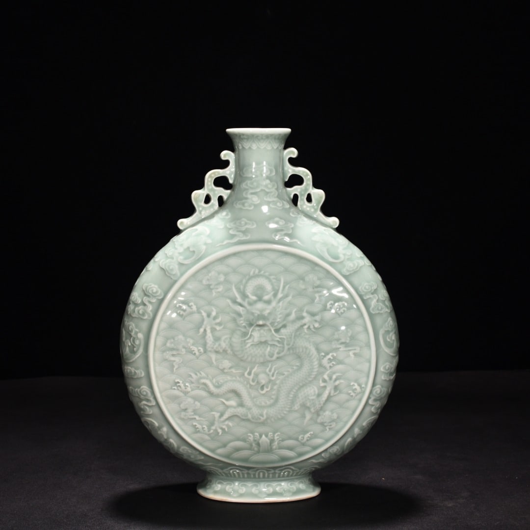 Qing Dynasty Qianlong pink celadon glaze carved dragons and phoenixes double-eared flat vase: Size: Height 27.5 cm - Width 20.5 cm Materials: Porcelain Time Period: Qing dynasty Manufactured Date: Qianlong Mark & Period Object: Chinese Antique ⛨ Purchase With Confidence ✔ Ve