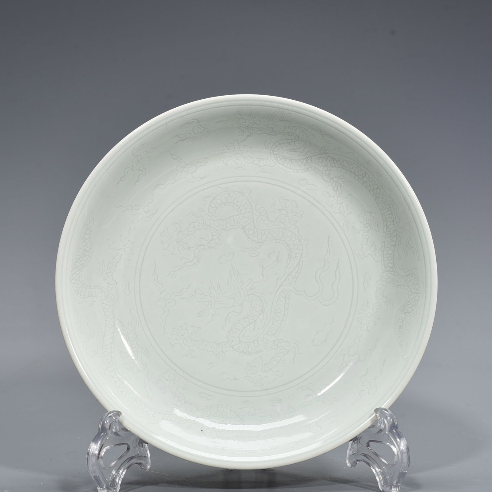 Ming Dynasty Xuande Festival red glaze engraved dragon plate: Size: Width 21 cm - Height 4 cm Materials: Porcelain Time Period: Ming dynasty Manufactured Date: Xuande Mark & Period Object: Chinese Antique ⛨ Purchase With Confidence ✔ Verified