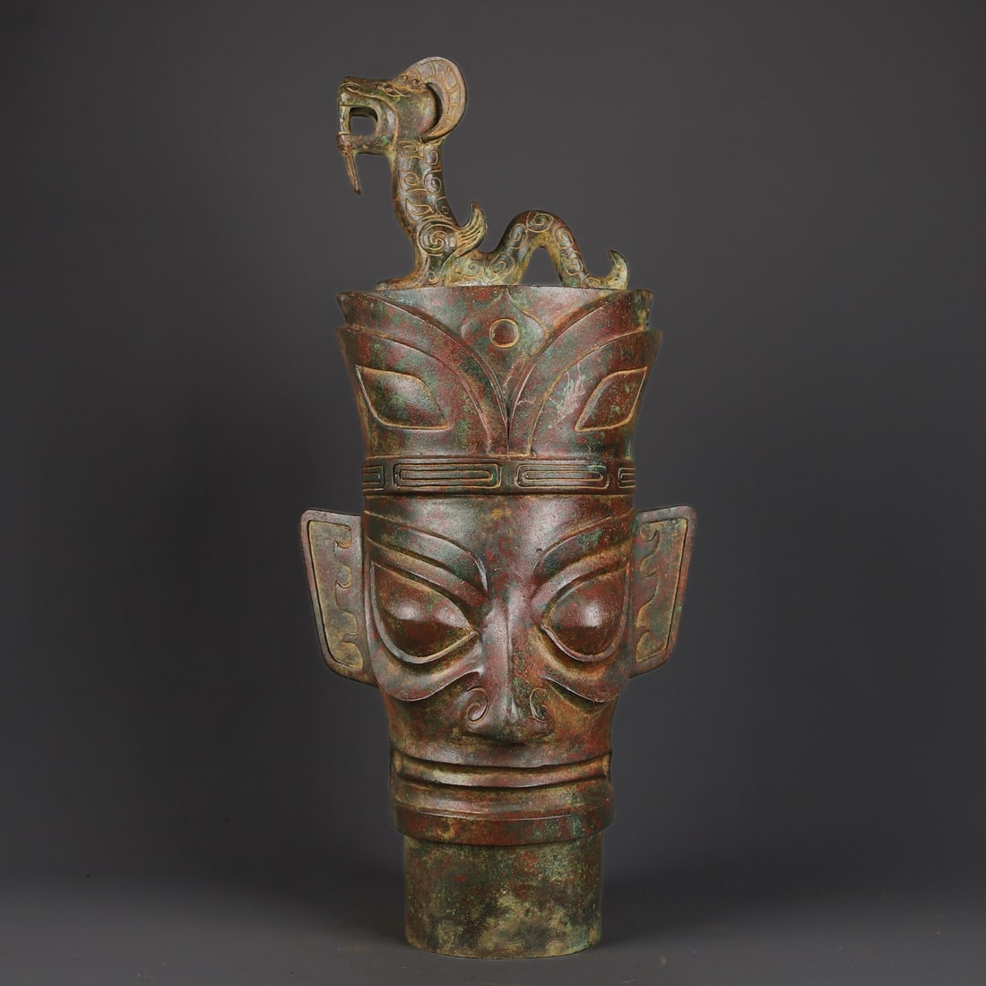 Sanxingdui Bronze standing dragon with eye-catching head: Size: Height 55 cm - Width 23 cm Materials: Bronze Time Period: Sanxingdui Manufactured Date: 1200-BC Period Object: Chinese Antique ⛨ Purchase With Confidence ✔ Verified Auction Ho