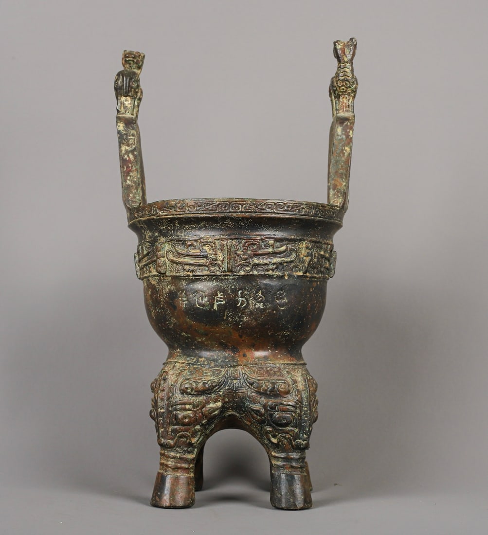 Zhou Dynasty Bronze animal mask He Zun: Size: Height 28 cm - Width 15 cm Materials: Bronze Time Period: Zhou dynasty Manufactured Date: 1050-BC Period Object: Chinese Antique ⛨ Purchase With Confidence ✔ Verified Auction