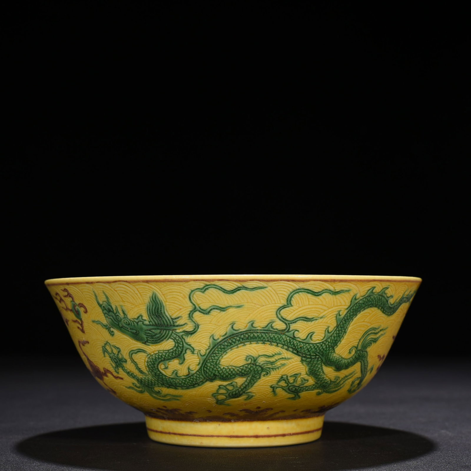 Ming Dynasty Chenghua yellow glaze sea-green dragon pattern thin bowl (1 of 9)
