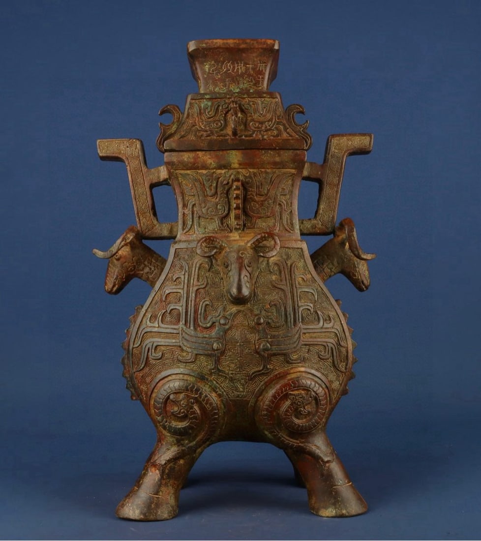 Zhou Dynasty Bronze four-legged sheep deer Vessel: Size: Height 39 cm - Width 24 cm Materials: Bronze Time Period: Zhou dynasty Manufactured Date: 1050-BC Period Object: Chinese Antique ⛨ Purchase With Confidence ✔ Verified Auction