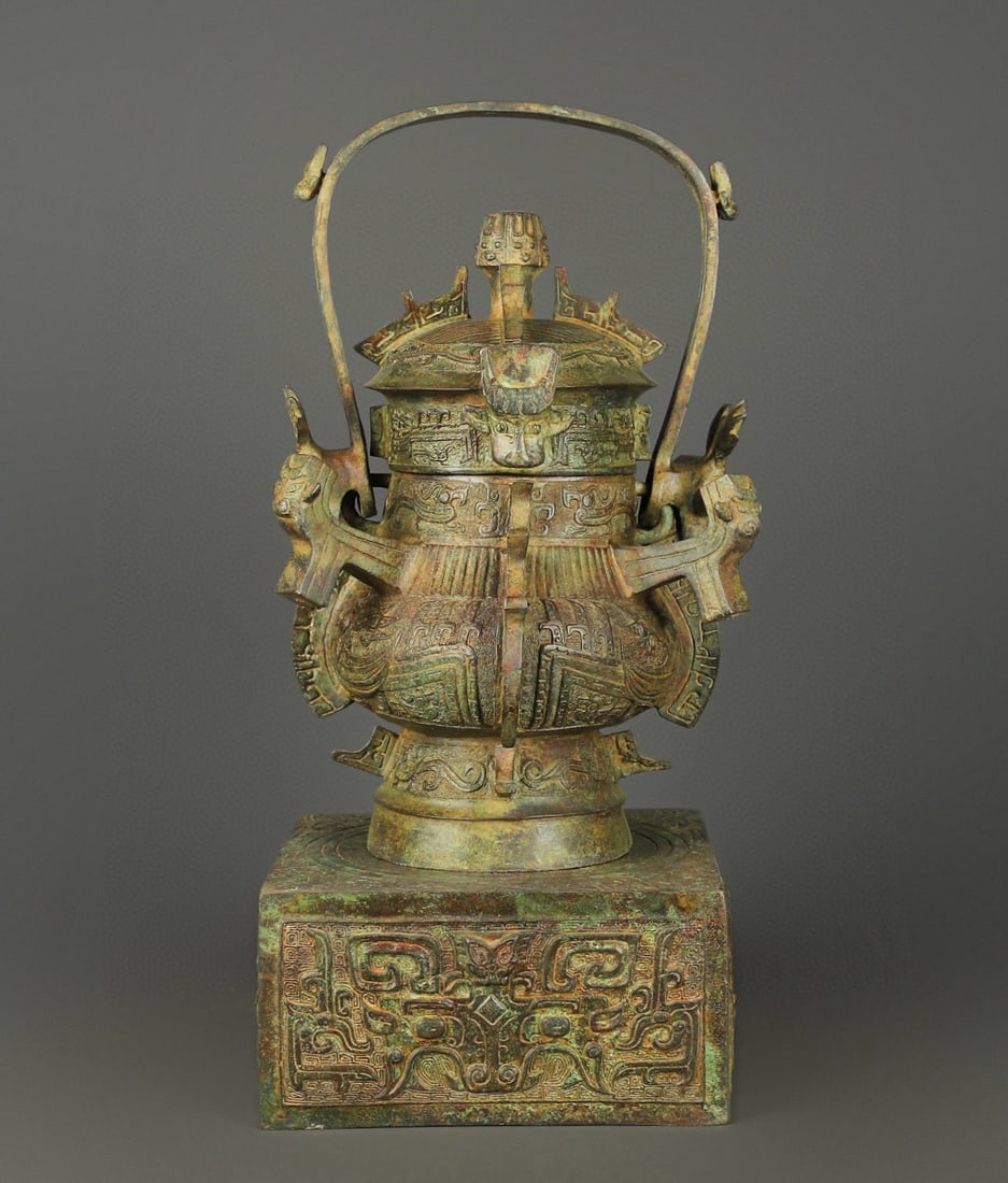 Zhou Dynasty Bronze square seated full-frame teapot: Size: Height 54 cm - Width 34 cm Materials: Bronze Time Period: Zhou dynasty Manufactured Date: 1050-BC Period Object: Chinese Antique ⛨ Purchase With Confidence ✔ Verified Auction