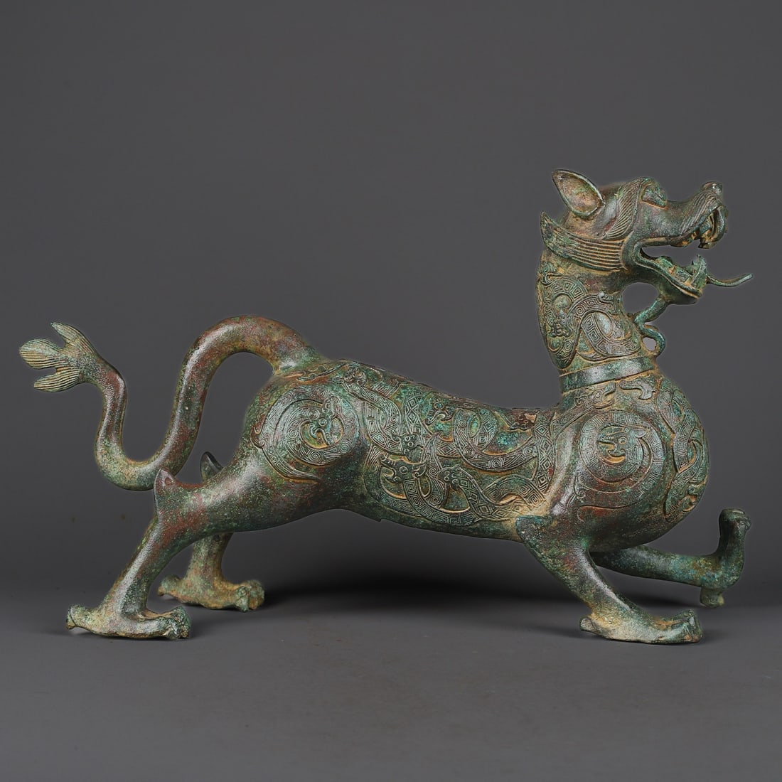 Zhou Dynasty Bronze long-tailed beast (1 of 9)