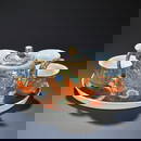 A SET OF PAINTED-ENAMEL 'DRAGON AND PHOENIX' TEAPOT AND CUPS