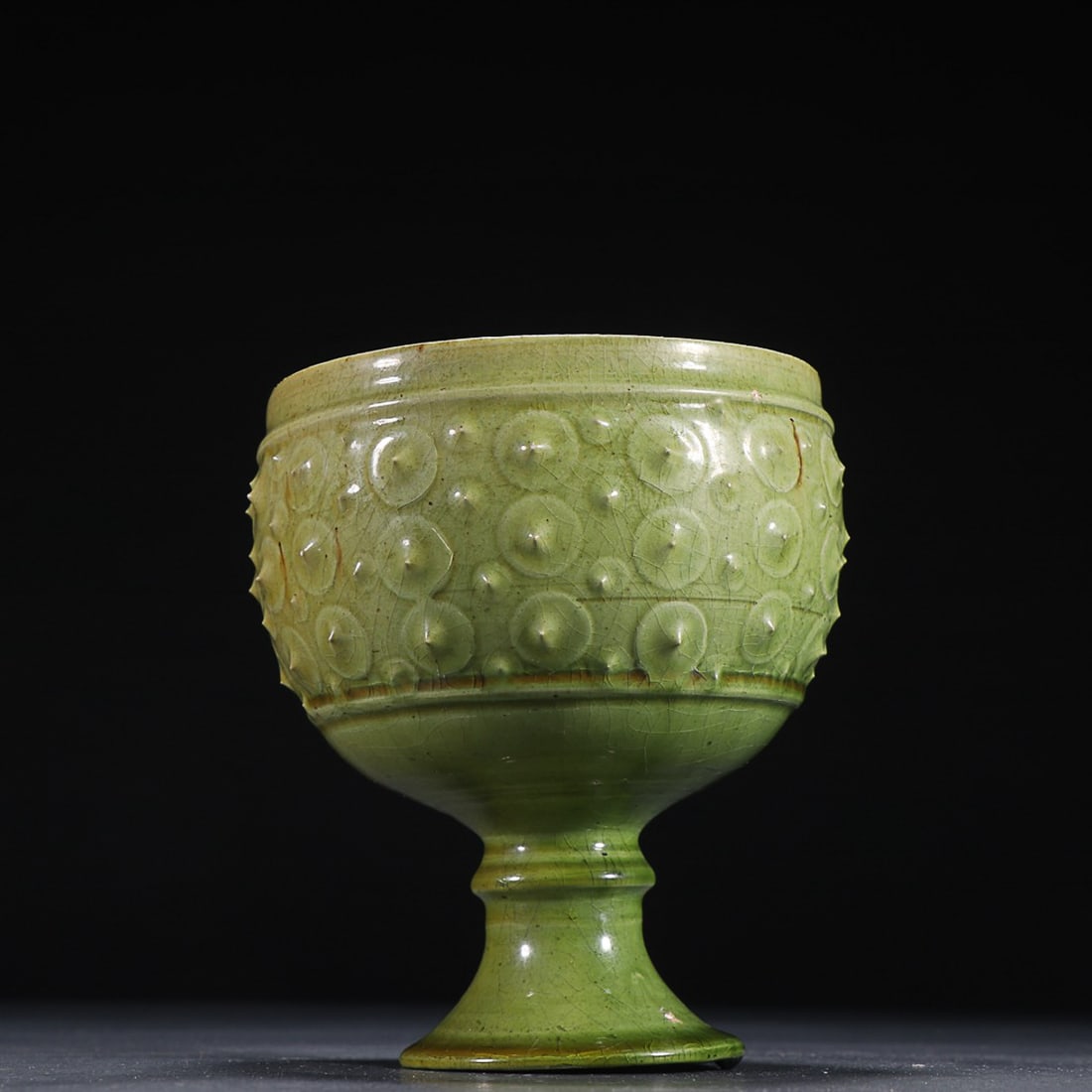 GREEN-GLAZED CUP: Dimension: Width: 11cm, Height: 12cm Property from an European private collection. Please contact the specialist department to request further information or additional images that may be available.