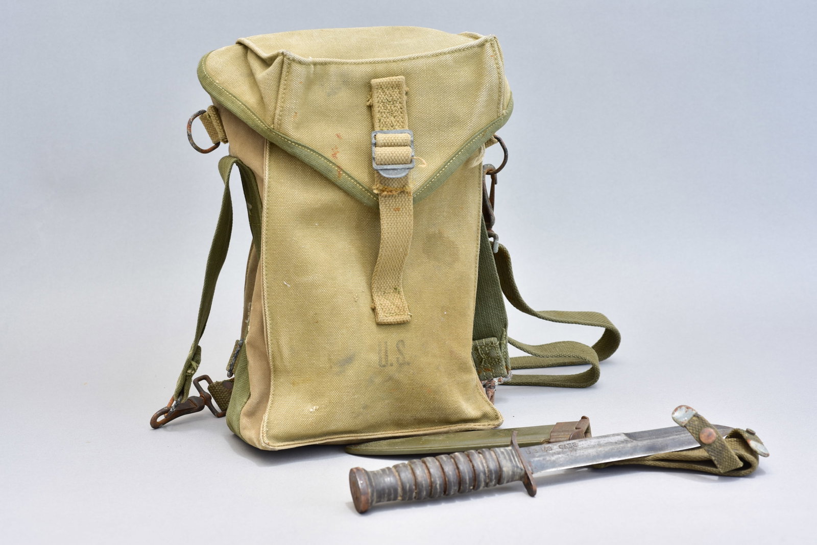 WWII USM3 Case Fighting Knife and 1944 Anchor Ammunition Pouch: Dimensions: Ammunition Pouch: 7 1/2" W x 5" D x 12" H Knife: 12 1/4" long with case"