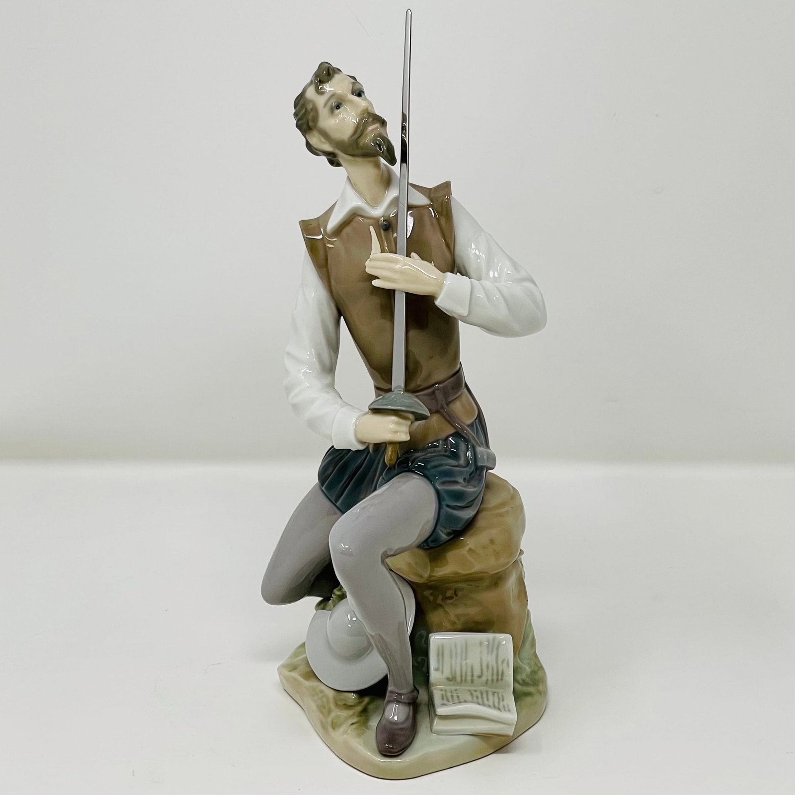 Lladro 5357 Oration Quixote Porcelain Figurine: Dimensions: 5 1/2”W x 5 1/2”D x 9”H