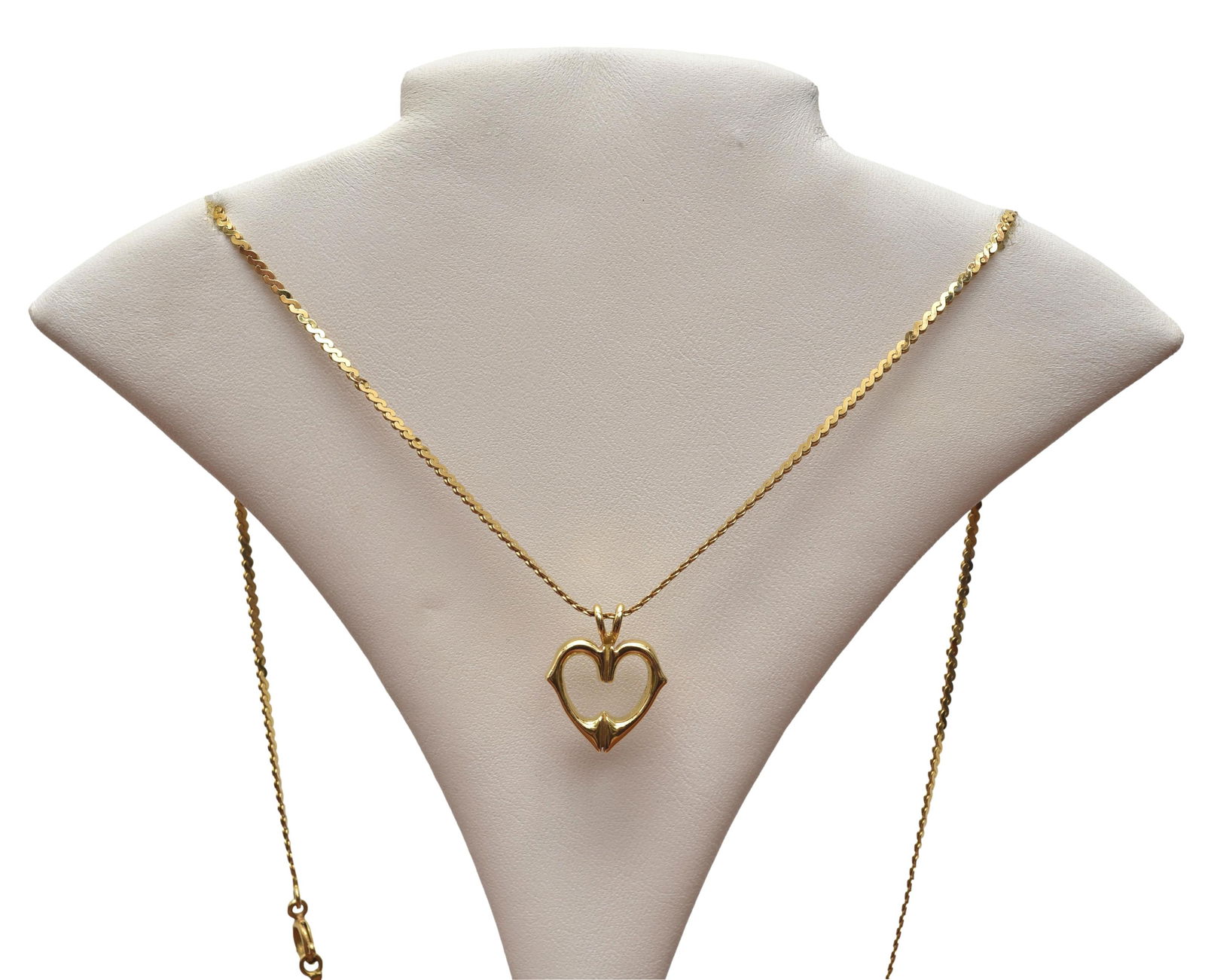 Signed Cartier 18K Yellow Gold Heart Pendant and S Chain Necklace: Dimensions: 18" long (chain) Weight: 9.1 grams Marked: Cartier / 18K / 744337 (pendant) - 750 (chain)