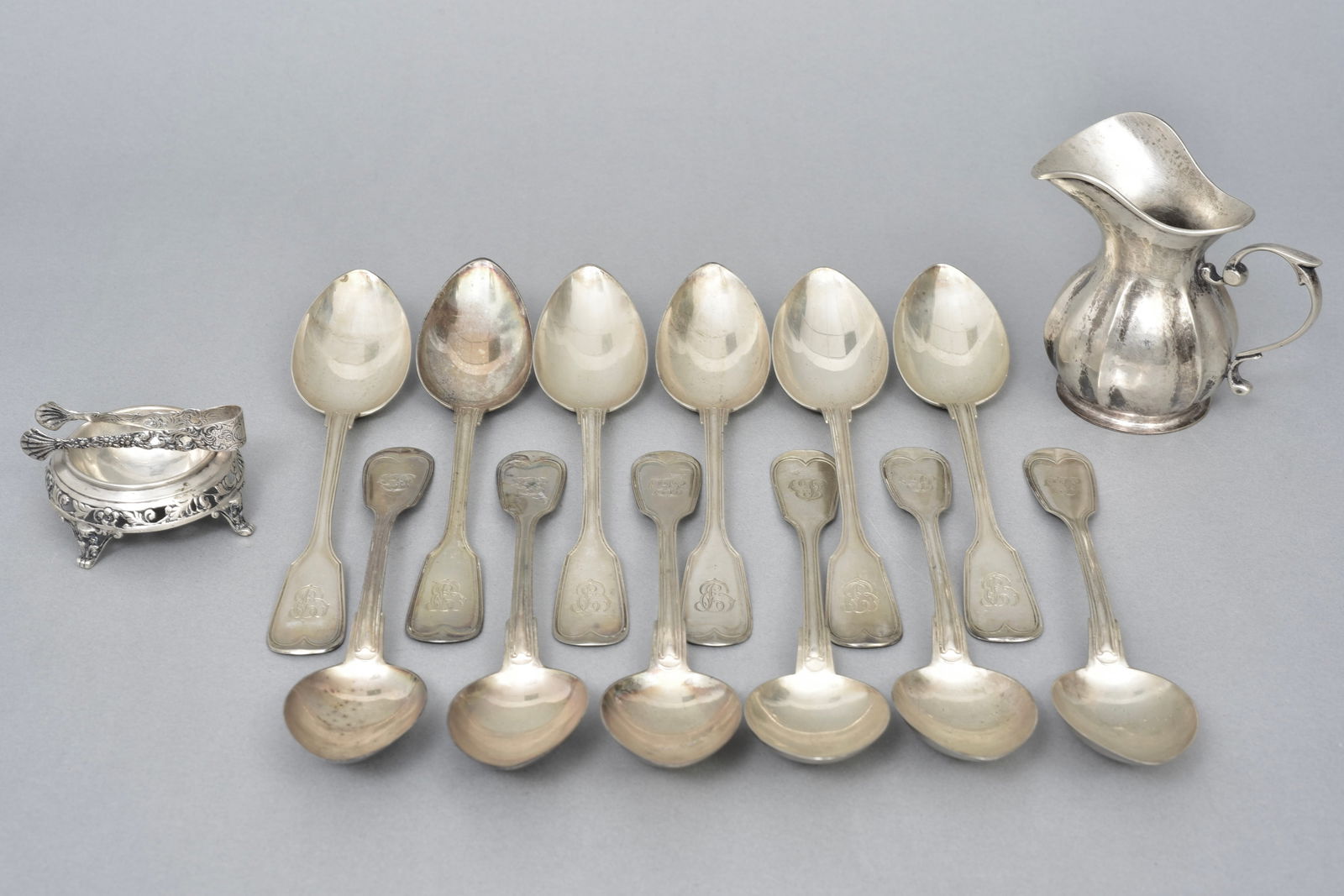 Collection of Twelve 800 Silver Serving Spoons, Creamer, Salt Cellar and Tongs (1 of 11)