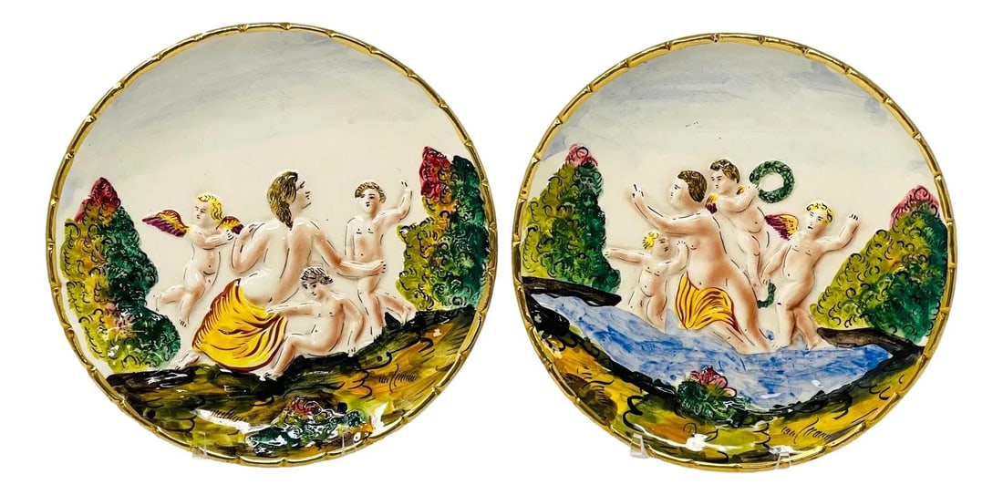 Pair Of Capodimonte Raised Relief Wall Plates: Dimensions: 7 1/2” diameter