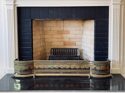 Antique Brass Fretted Fireplace Fender With Lion Paw Feet: Dimensions: 50 1/2”W x 8”D x 8 1/2”H Town Auction House & Gallery offers local delivery to Manhattan, Connecticut and Westchester for most items excluding large furniture. For a pric