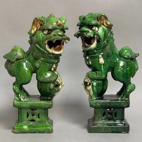 Pair Of 20th Century Chinese Sancai Green Glazed Ceramic Foo Dogs